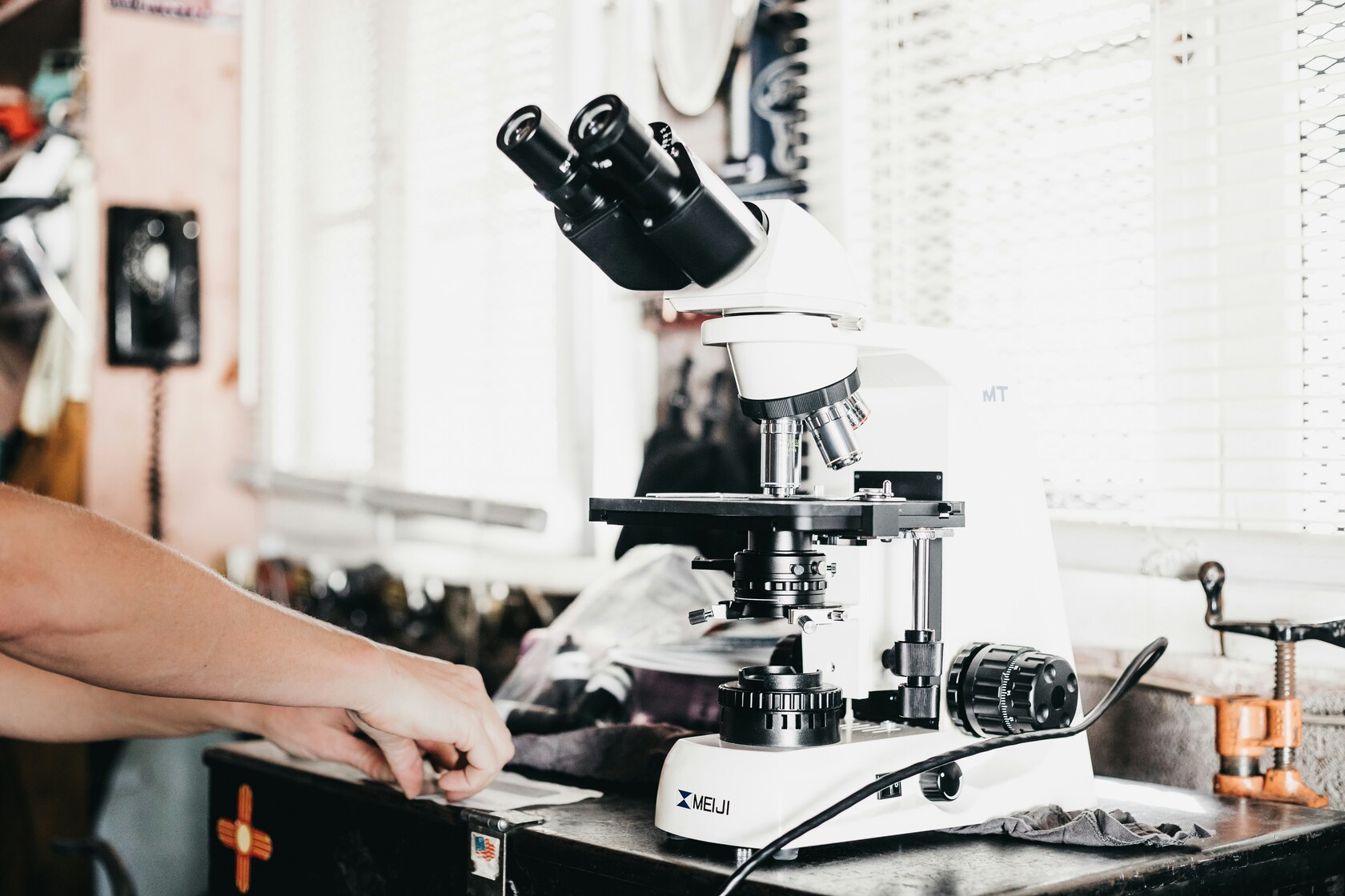 International School Singapore : Students exploring experiments in a fully equipped science laboratory.