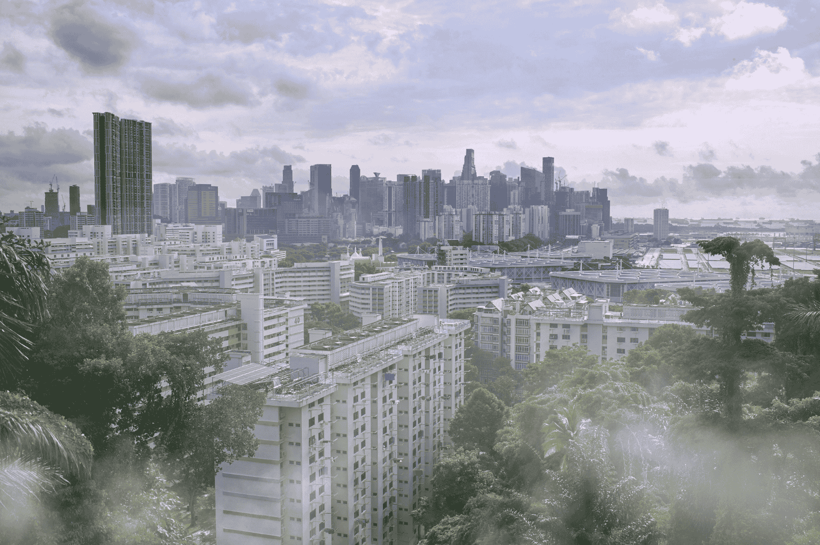 City skyline and neighborhoods covered in light haze, showing reduced visibility during pollution season