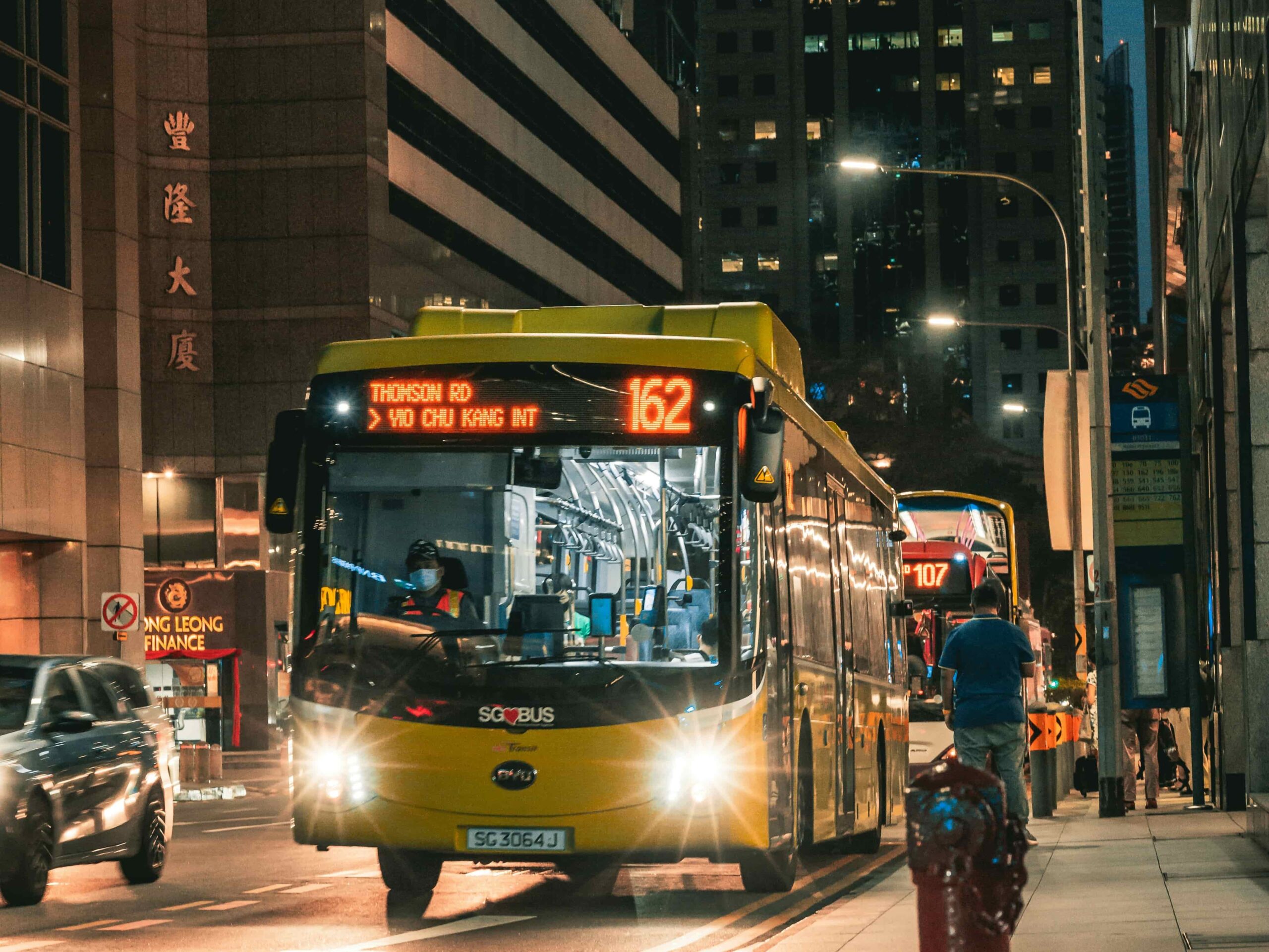 A photo of an SG Bus during rush hour in Singapore.