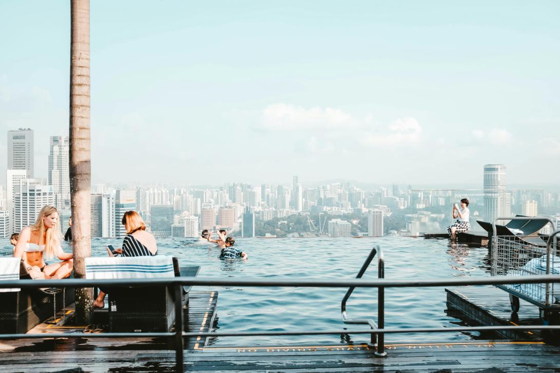 A photo of the infinity pool above the famous Marina Bay Sands hotel as guest spend their leisure time in the water.