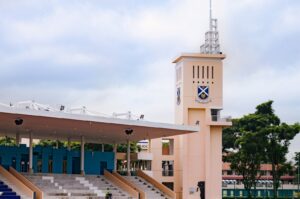 St. Andrew's Junior College in Singapore, featuring a prominent clock tower in front of the large building.