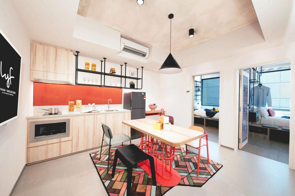 Modern shared kitchen and dining area at lyf Funan Singapore.