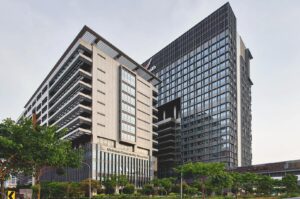 Modern public hospital building in Singapore’s healthcare system.