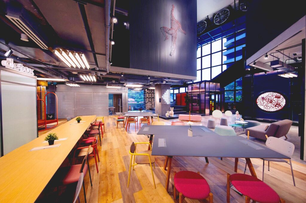 Colorful coworking and social lounge at lyf Funan Singapore.
