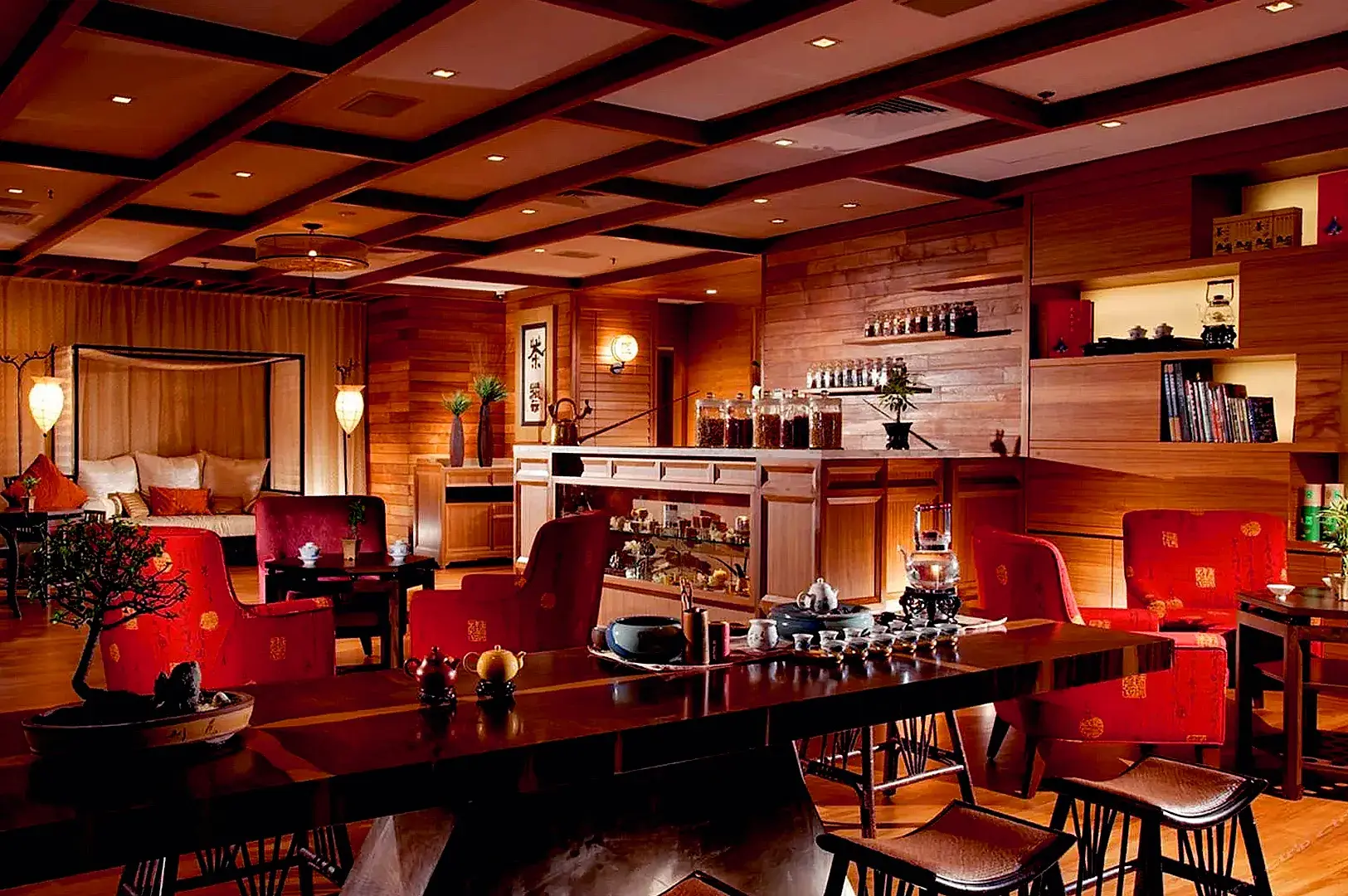 Elegant Chinese tea lounge in Singapore with cozy seating and wooden interiors