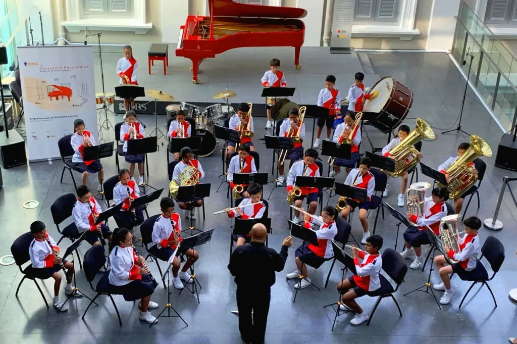 Singapore school band CCA performance students music program holistic education activities