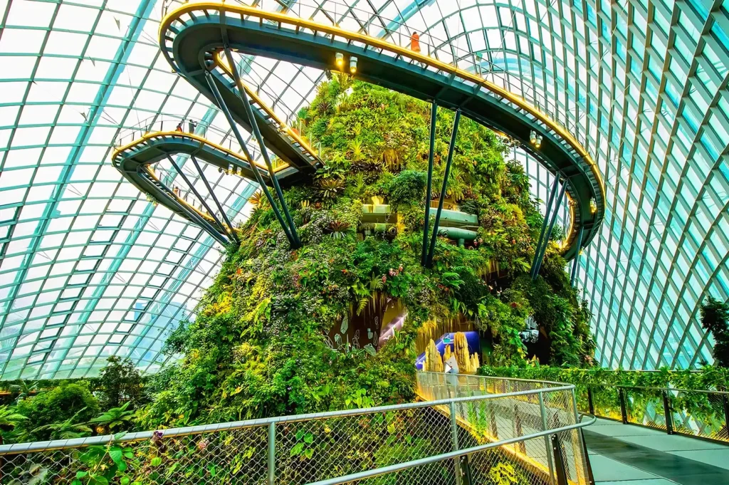 Cloud Forest conservatory at Gardens by the Bay Singapore featuring elevated walkway and indoor vertical tropical garden