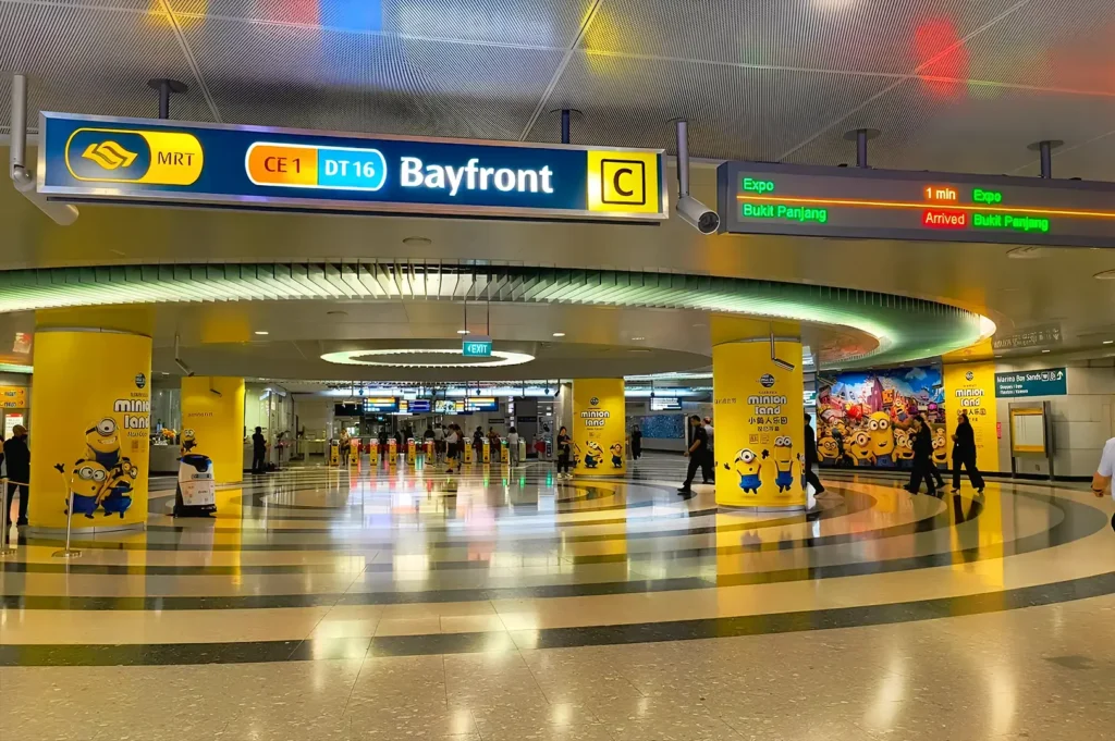 Bayfront MRT station entrance in Singapore near Gardens by the Bay with modern public transport signage and urban interior design