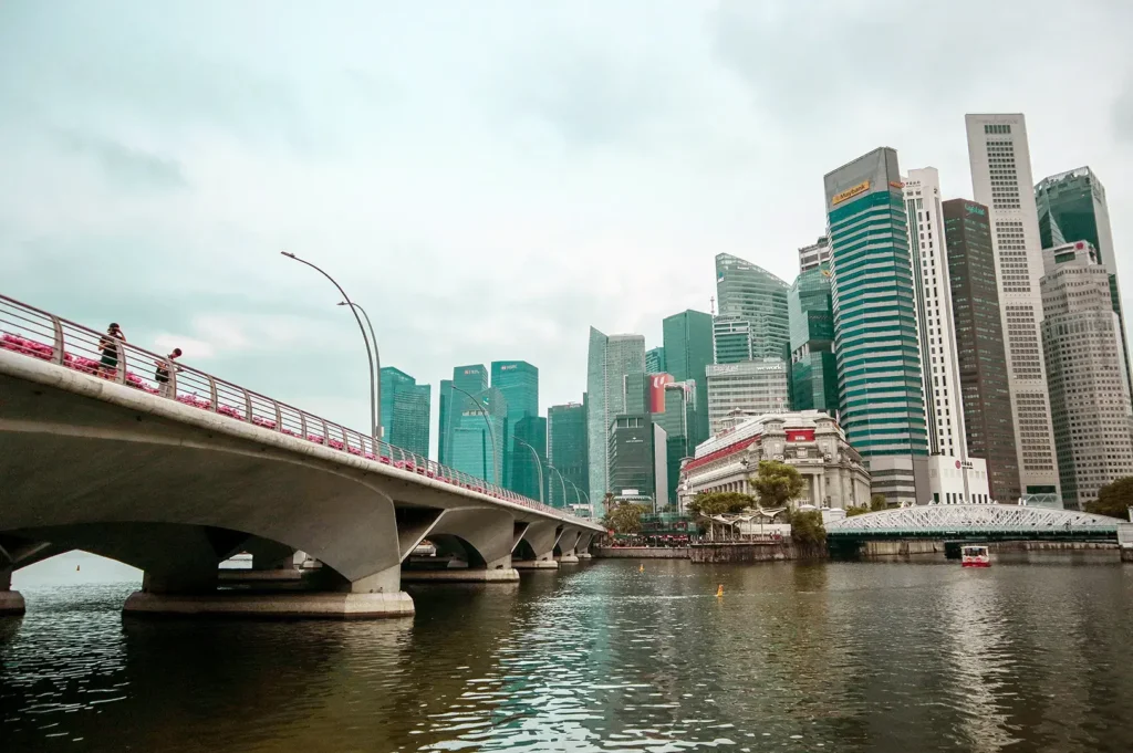 Singapore skyline viewed from a bridge over the river.