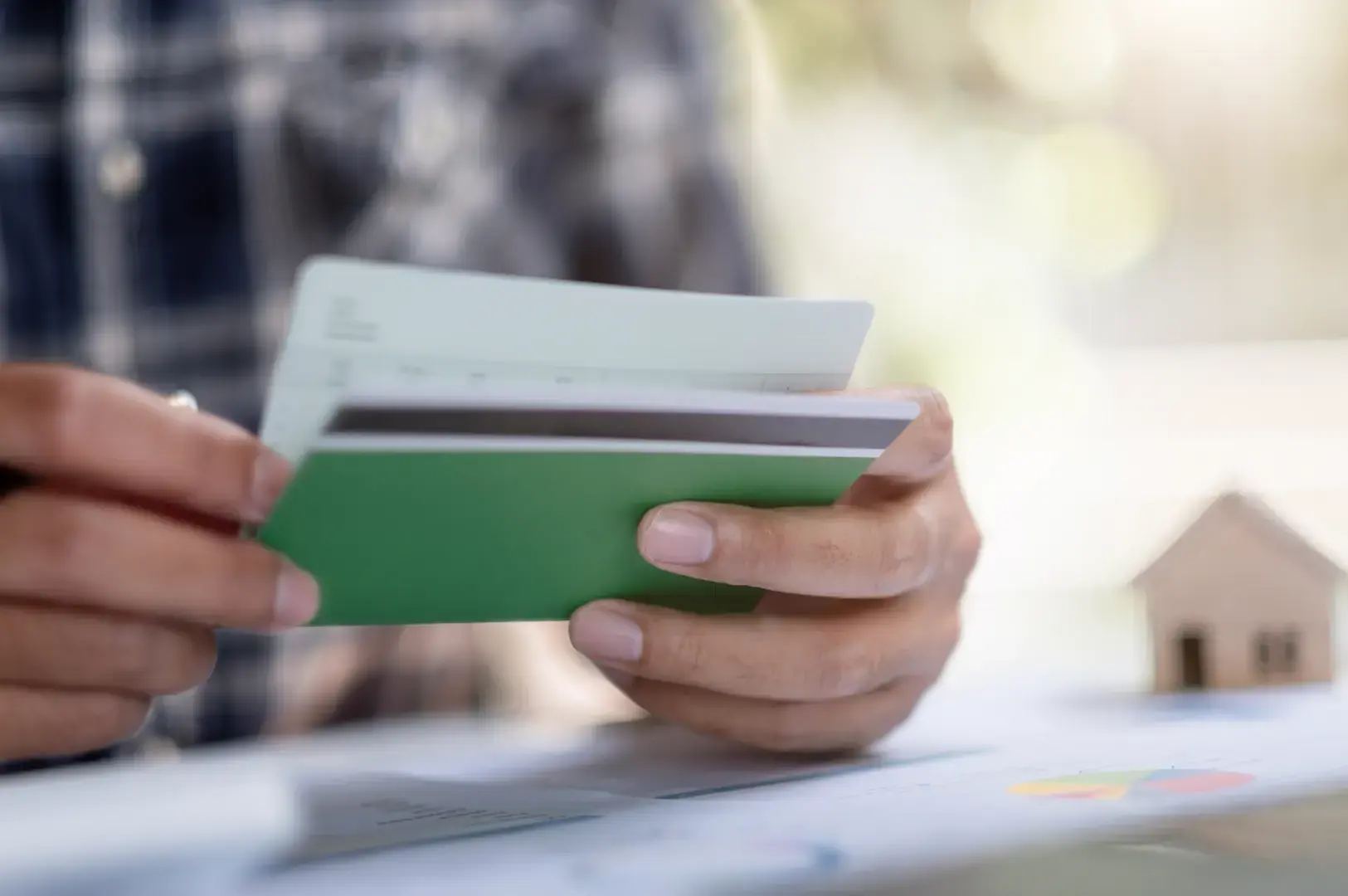 Hand holding bank passbook